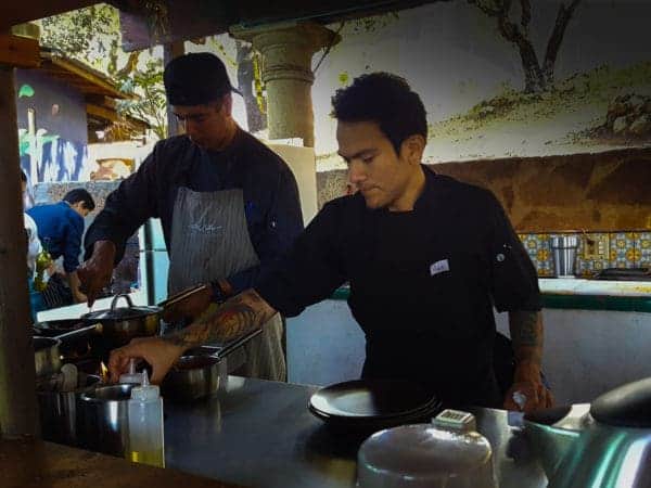 Chefs in the open air kitchen at Malva