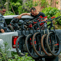 Pickup truck carrying mtbs using a tailgate bike pad for trucks