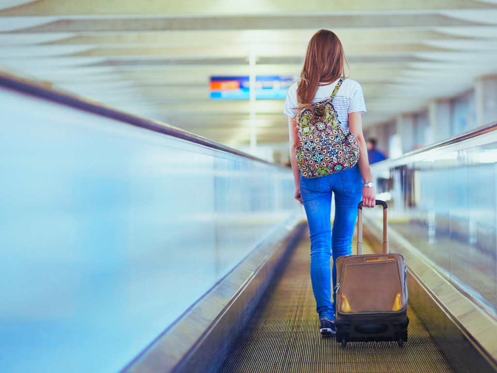 Girl with Backpack and suitcase 