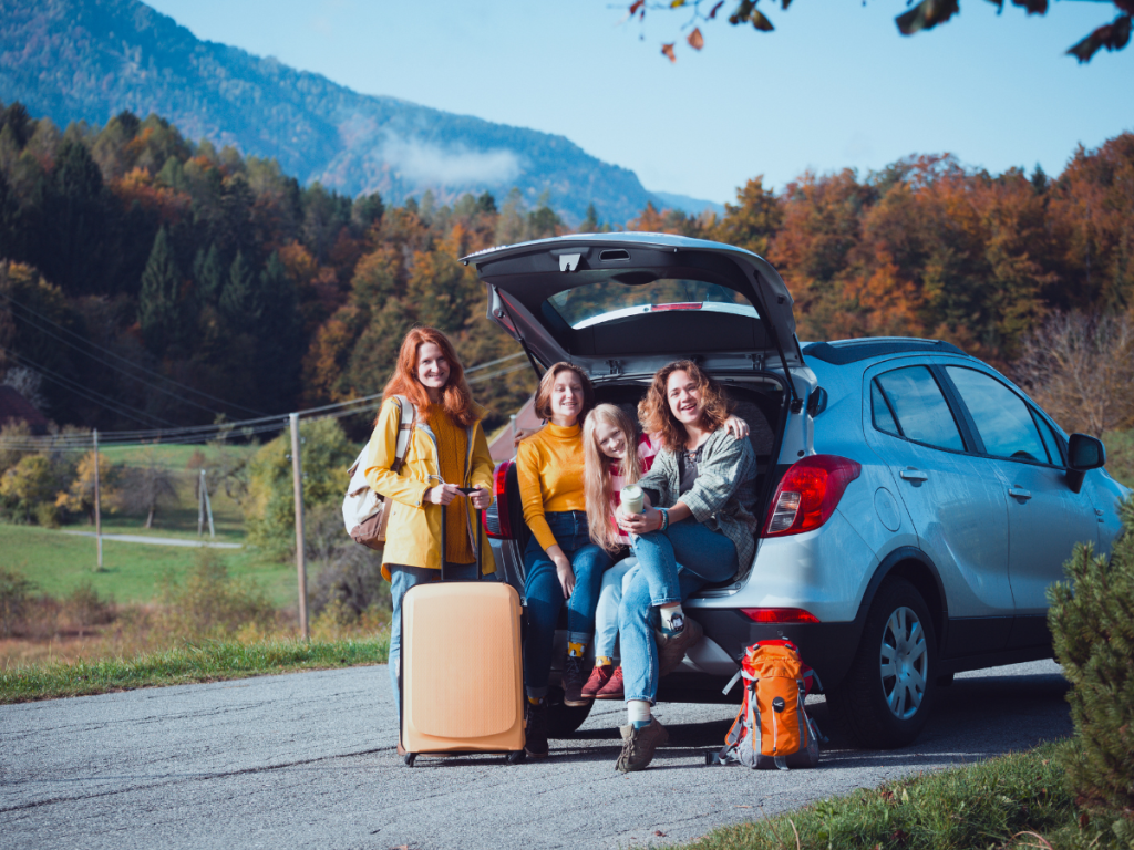Group of young women setting out on a road trip