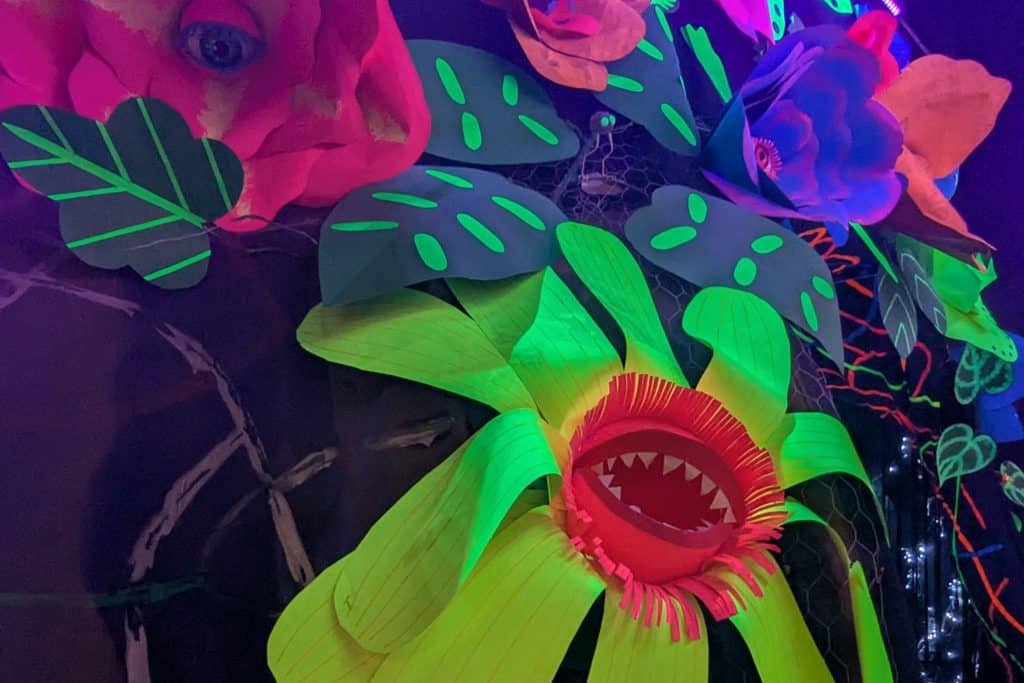A large flower with neon lights.