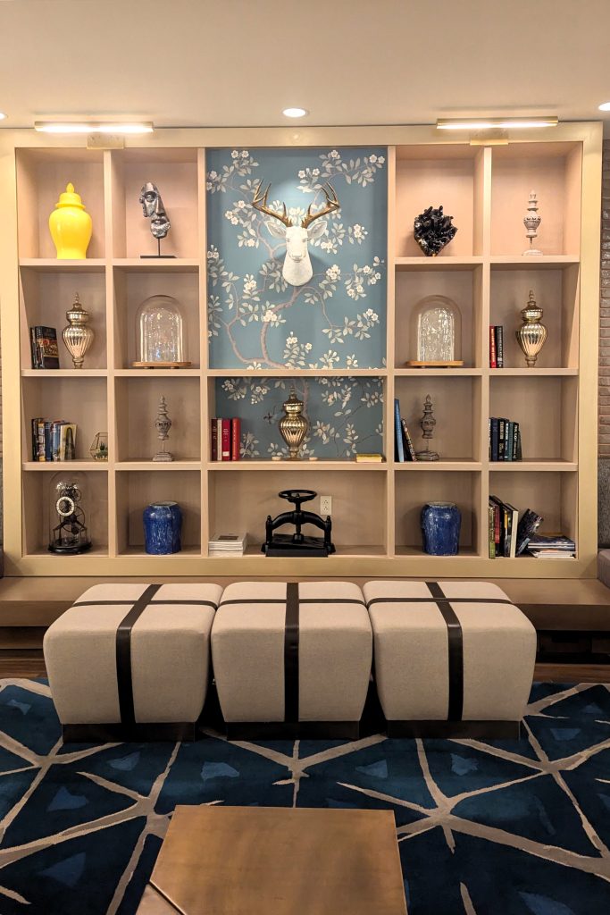 Lobby of The Draftsman with blue and beige decor.